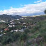 homes at the base of the hills leading up to Canillas near to the proposed site