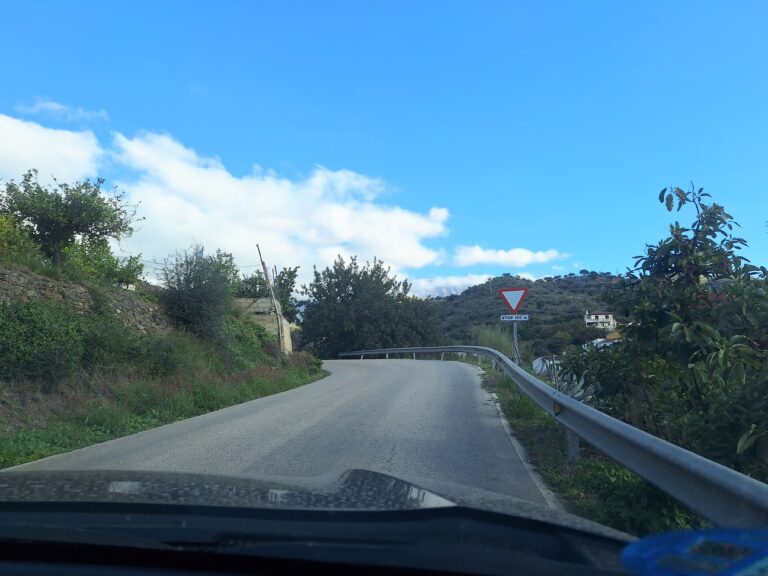 narrow winding road with blind corners